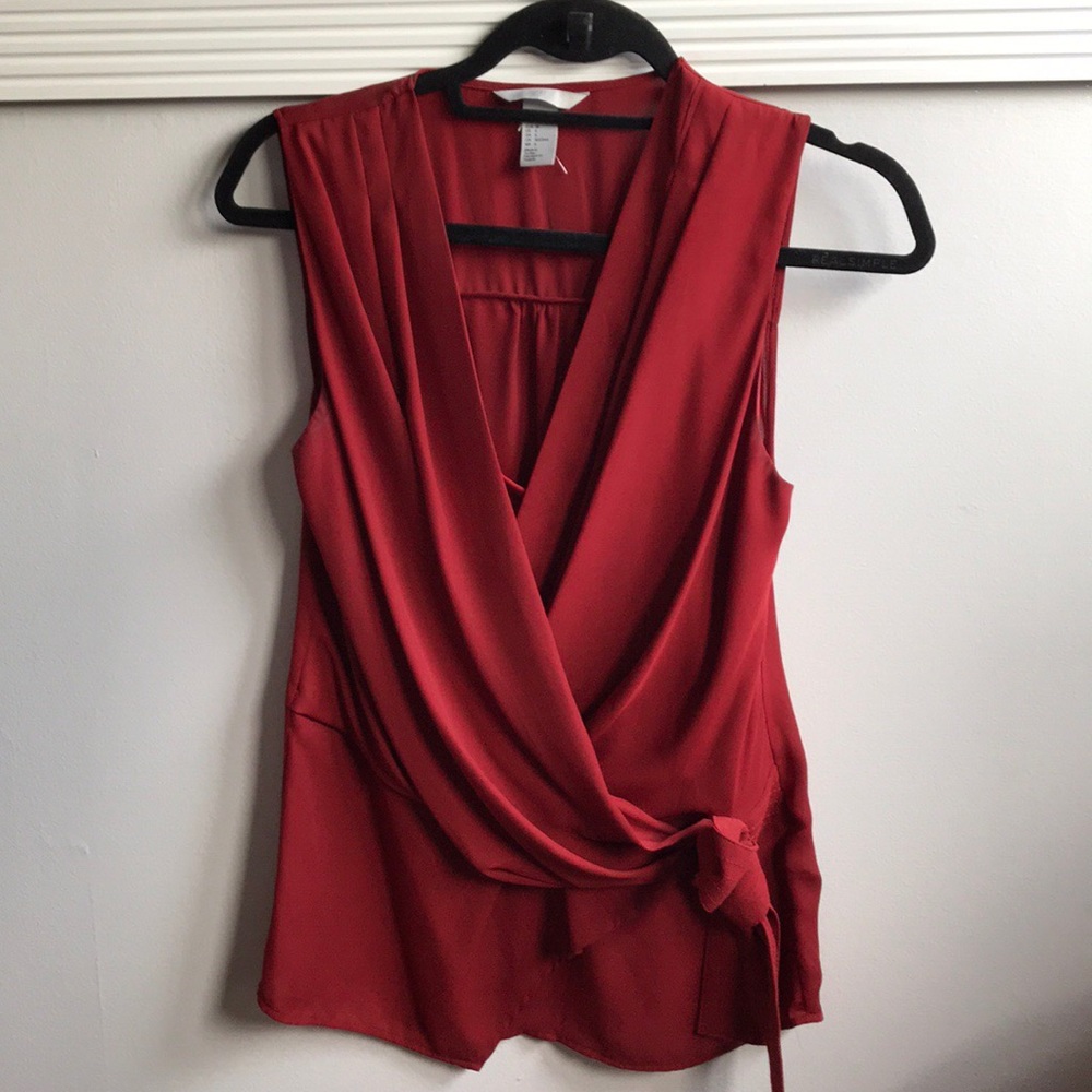 Red sleeveless blouse